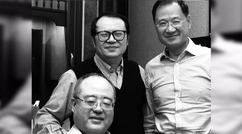 许章润教授与友人合影。(推特图片)