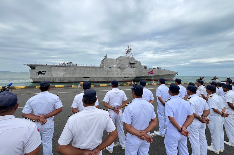 Royal Cambodian Navy personnel line up as the littoral combat ship USS Savannah docks in Cambodia's southern port city of Sihanoukville on December 16, 2024. (Photo by Suy SE / AFP)