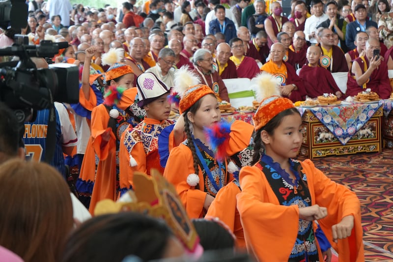 Young children perform during celebrations on the 90th birthday of the Dalai Lama at the Main Temple in Dharamsala, India, July 6, 2025.