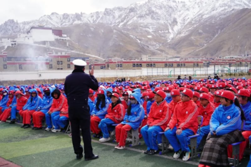 The Public Security Bureau of Suo County carries out publicity activity at the county's middle school in Nyingtri county, Tibet,on March 8, 2025.